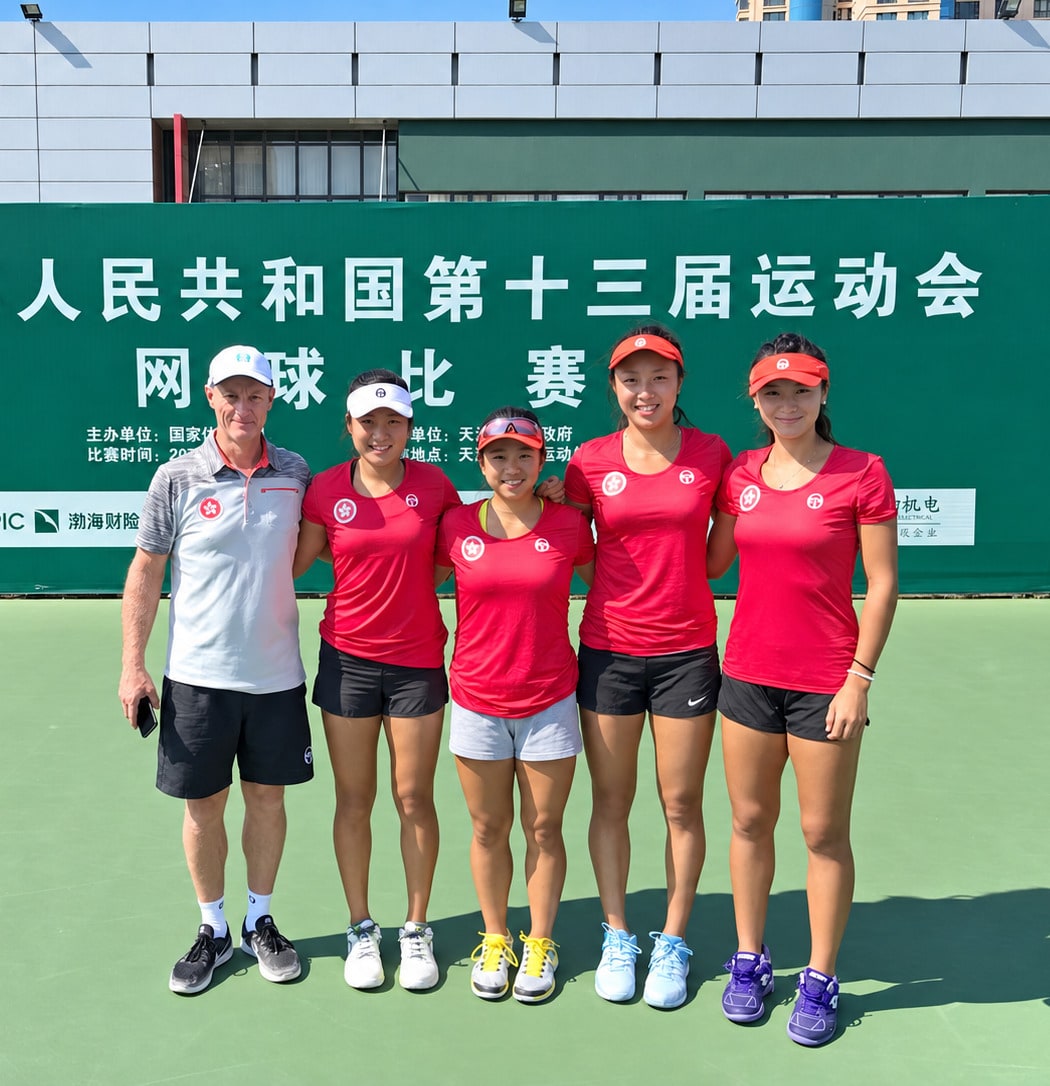 Jeff King with the Hong Kong women’s team on court at the 13th National Games of China.
